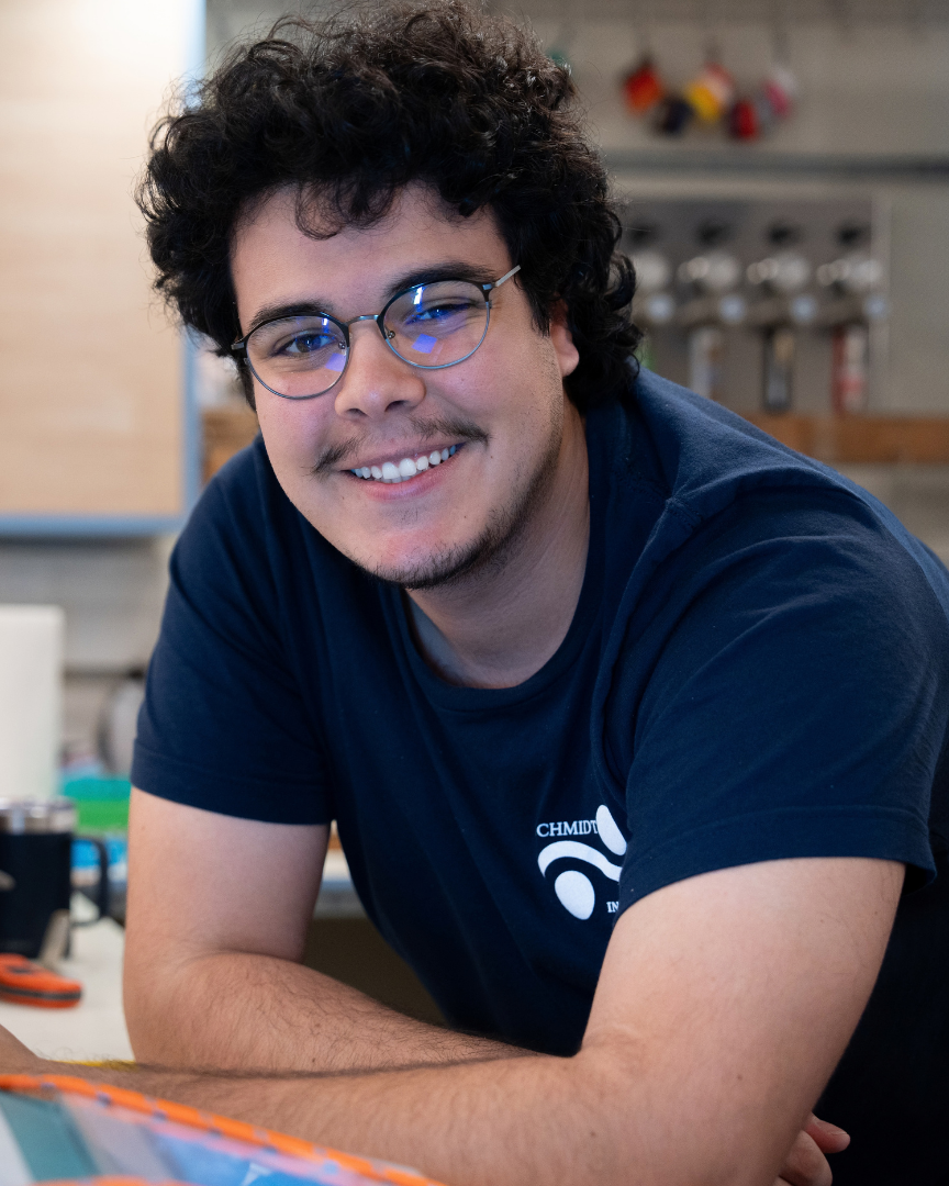Mattia smiles while doing a winkler titration.